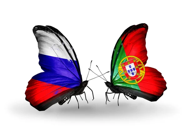 Two butterflies with flags of Russia and Portugal on wings — Stock Photo, Image