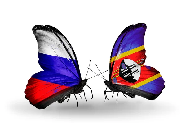 Two butterflies with flags of Russia and Swaziland on wings — Stock Photo, Image