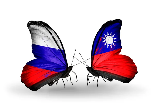 Deux papillons avec des drapeaux de la Russie et de Taiwan sur les ailes — Photo