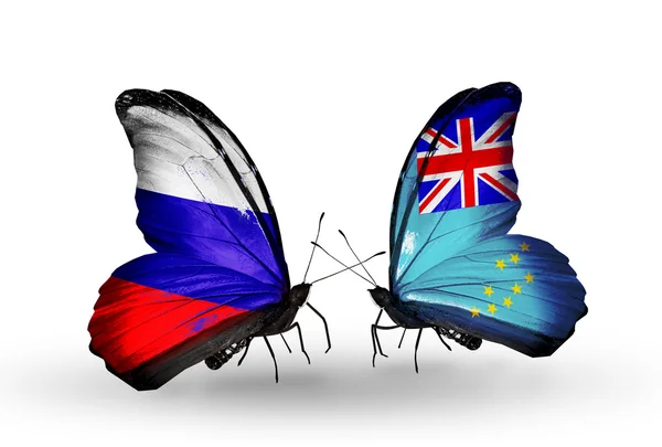 Due farfalle con le bandiere della Russia e Tuvalu sulle ali — Foto Stock