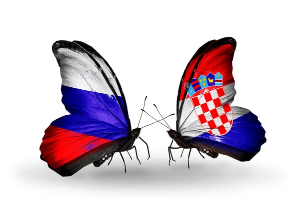 Deux papillons avec des drapeaux de la Russie et de la Croatie sur les ailes — Photo