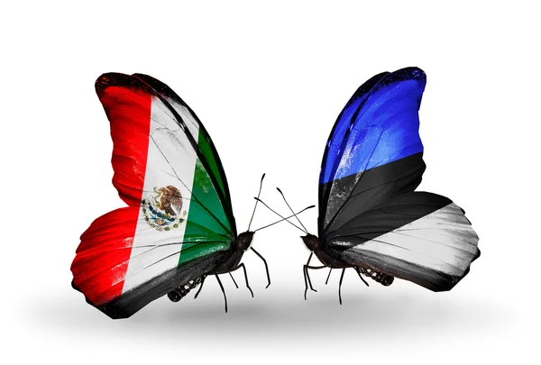 Duas borboletas com bandeiras de México e Estônia em asas — Fotografia de Stock