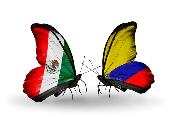 Due farfalle con le bandiere del Messico e della Colombia sulle ali — Foto Stock