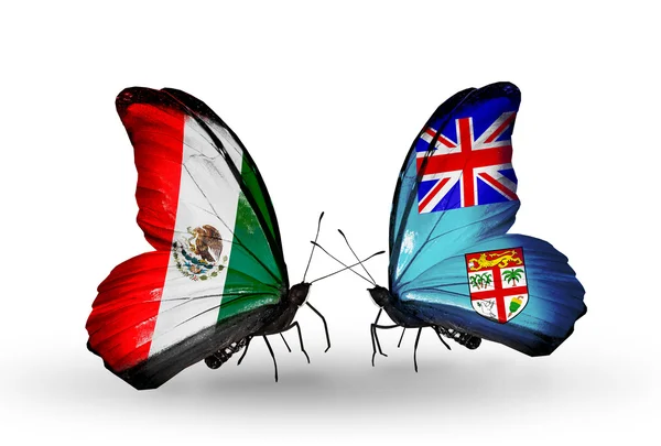 Two butterflies with flags of Mexico and Fiji on wings — Stock Photo, Image