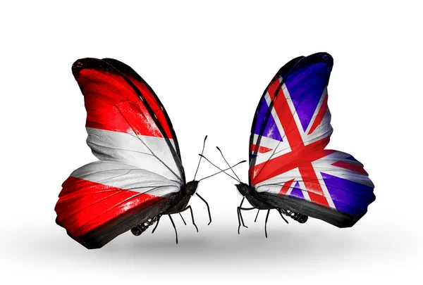 Butterflies with Austria and UK flags — Stock Photo, Image