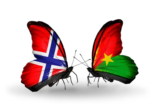 Butterflies with Norway and Burkina Faso flags — Stock Photo, Image