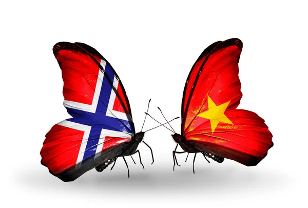 Farfalle con bandiere di Norvegia e Vietnam — Foto Stock