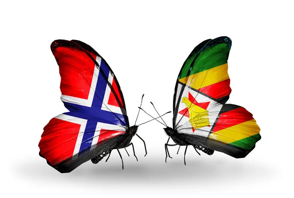 Mariposas con banderas de Noruega y Zimbabue en alas — Foto de Stock