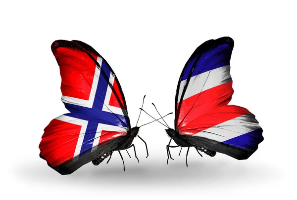 Papillons avec drapeaux Norvège et Costa Rica sur les ailes — Photo