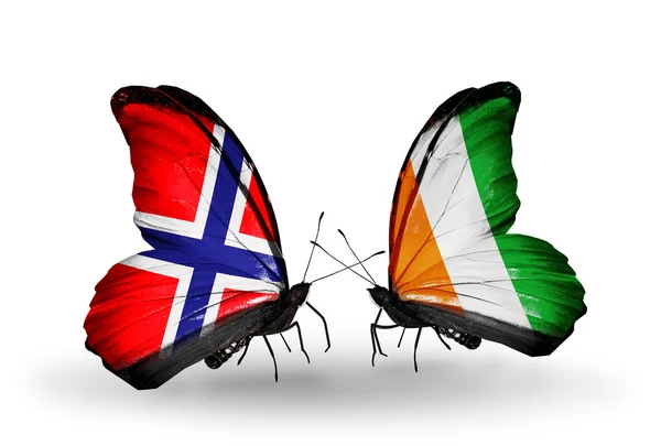 Butterflies with Norway and Cote Divoire flags on wings — Stock Photo, Image