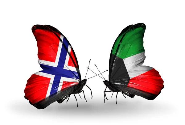 Butterflies with Norway and Kuwait flags on wings — Stock Photo, Image