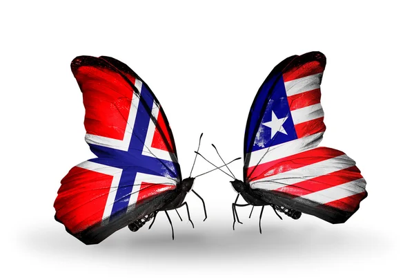 Papillons avec drapeaux Norvège et Libéria sur les ailes — Photo