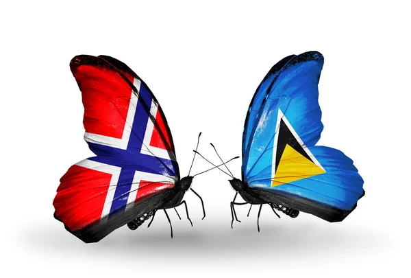 Motyle z Norwegii i saint lucia flagi na skrzydłach — Zdjęcie stockowe