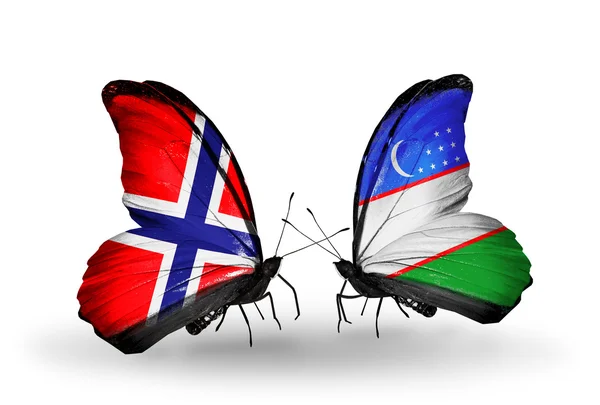 Borboletas com bandeiras da Noruega e do Uzbequistão em asas — Fotografia de Stock