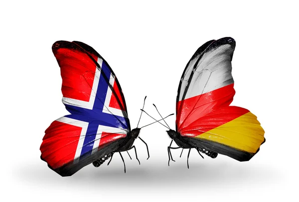Farfalle con bandiere Norvegia e Ossezia del Sud sulle ali — Foto Stock