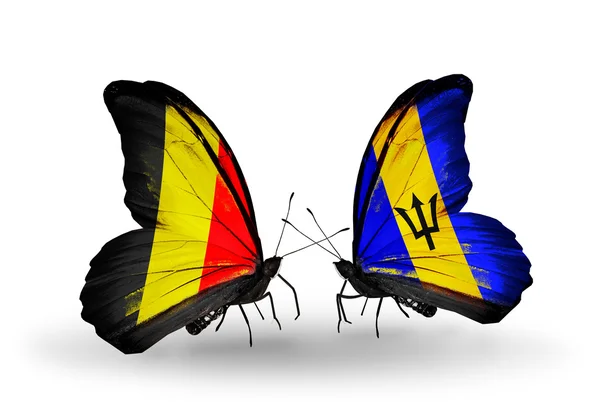 Butterflies with Belgium and Barbados flags on wings — Stock Photo, Image