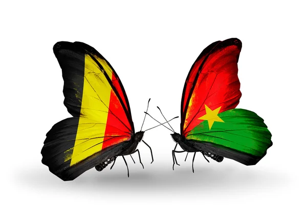 Borboletas com bandeiras da Bélgica e Burkina Faso em asas — Fotografia de Stock