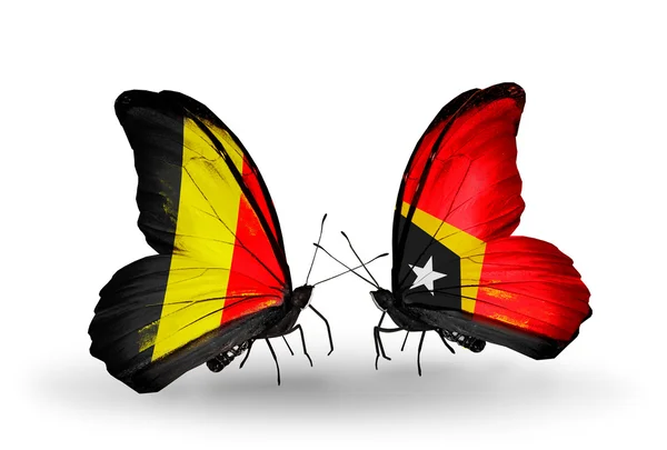 Butterflies with Belgium and East Timor flags on wings — Stock Photo, Image