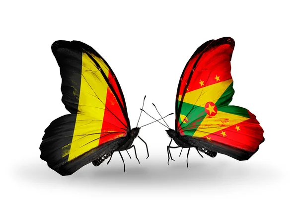 Vlinders met België en grenada vlaggen op vleugels — Stockfoto