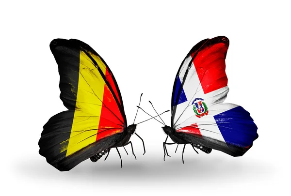 Butterflies with Belgium and Dominicana flags on wings — Stock Photo, Image