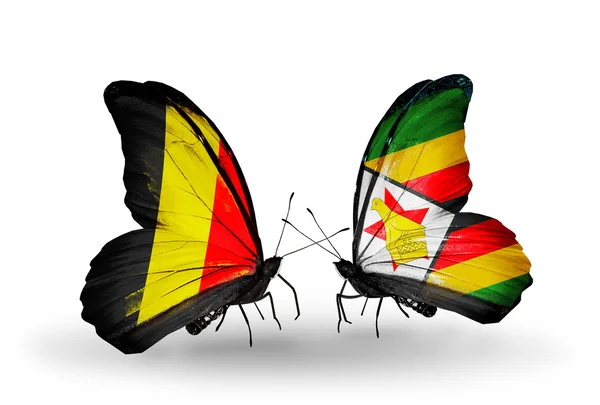 Borboletas com bandeiras da Bélgica e do Zimbábue em asas — Fotografia de Stock