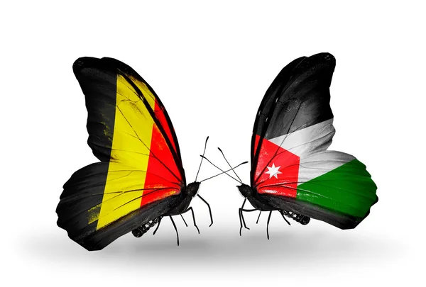 Motýli s Belgií a Jordánsko vlajky na křídlech — Stock fotografie
