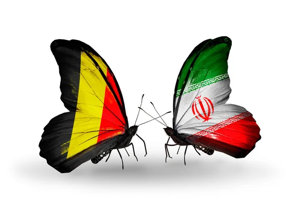 Borboletas com bandeiras da Bélgica e do Irã em asas — Fotografia de Stock