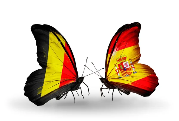 Butterflies with Belgium and Spain flags on wings — Stock Photo, Image