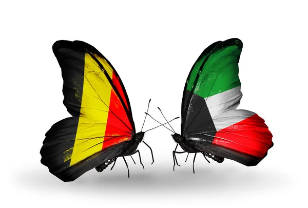 Butterflies with Belgium and Kuwait flags on wings — Stock Photo, Image