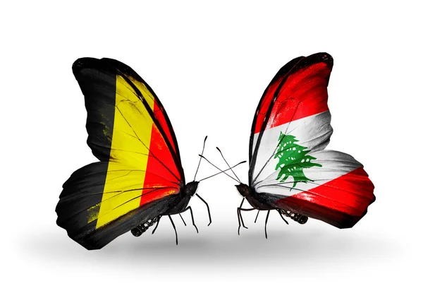 Butterflies with Belgium and Lebanon flags on wings — Stock Photo, Image