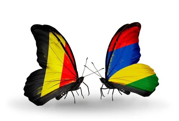 Butterflies with Belgium and Mauritius flags on wings — Stock Photo, Image