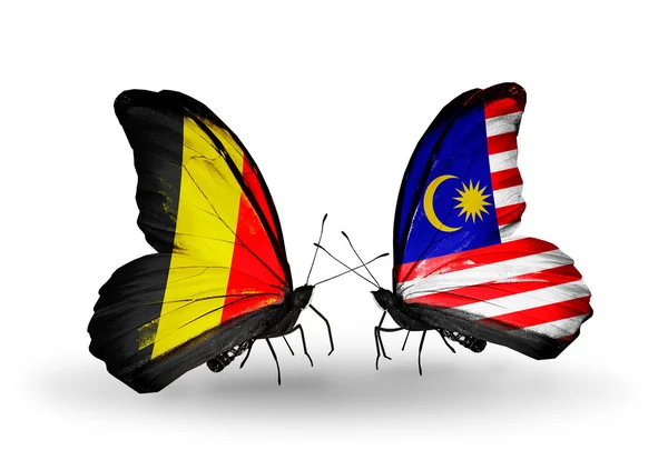 Butterflies with Belgium and Malaysia flags on wings — Stock Photo, Image