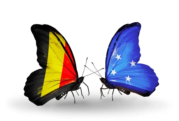 Mariposas con banderas de Bélgica y Micronesia en alas — Foto de Stock