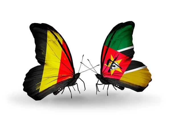 Butterflies with Belgium and Mozambique flags on wings — Stock Photo, Image