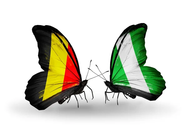 Vlinders met vlaggen België en nigeria op vleugels — Stockfoto