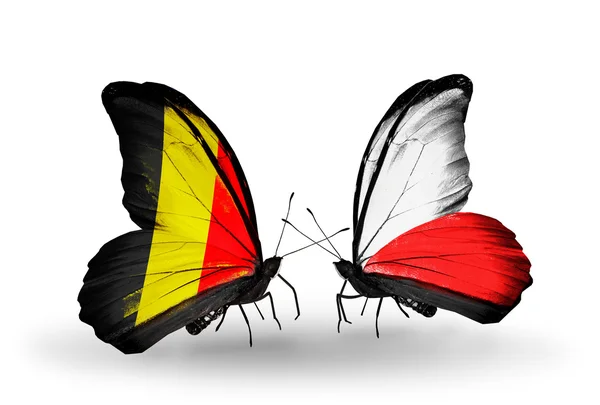 Butterflies with Belgium and Poland flags on wings — Stock Photo, Image