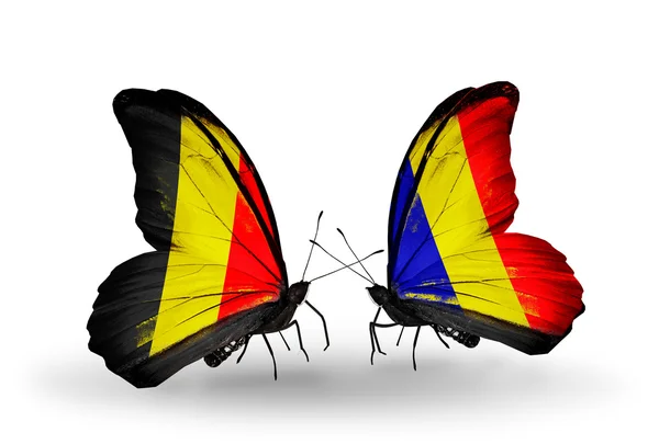 Farfalle con Belgio e Ciad, Romania bandiere sulle ali — Foto Stock
