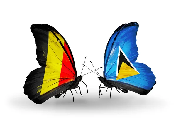 Mariposas con banderas de Bélgica y Santa Lucía en alas — Foto de Stock