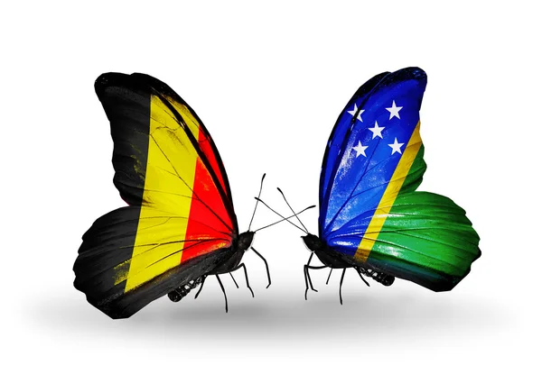 Butterflies with Belgium and Solomon Islands flags on wings — Stock Photo, Image