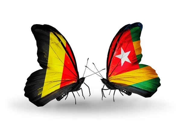 Borboletas com bandeiras da Bélgica e do Togo em asas — Fotografia de Stock