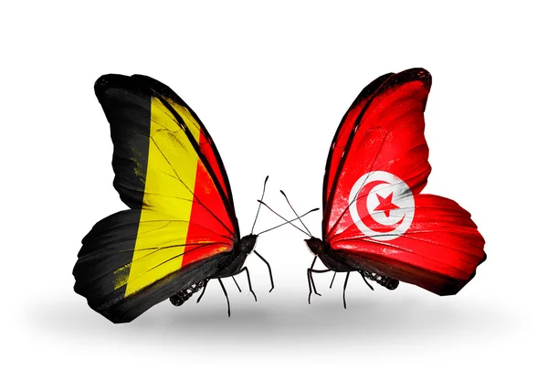 Butterflies with Belgium and Tunisia flags on wings — Stock Photo, Image