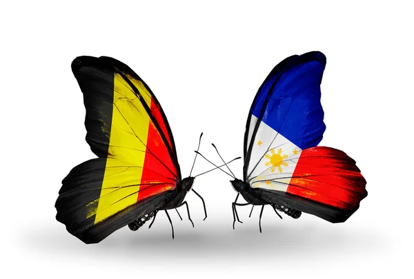 Schmetterlinge mit belgischen und philippinischen Flaggen auf Flügeln — Stockfoto
