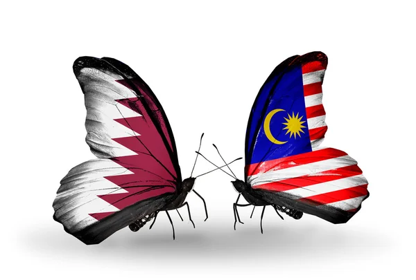 Πεταλούδες με το Κατάρ και τη Μαλαισία σημαίες με φτερά — Φωτογραφία Αρχείου