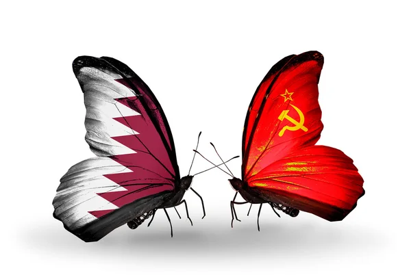 Kelebek kanatları üzerinde Katar ve Sovyetler Birliği bayraklı — Stok fotoğraf