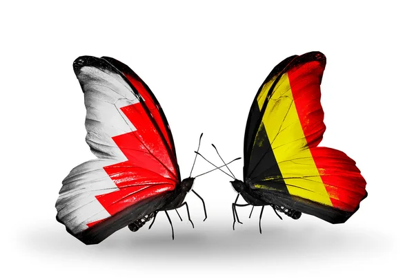 Borboletas com bandeiras do Barém e da Bélgica em asas — Fotografia de Stock