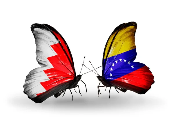 Butterflies with Bahrain and Venezuela flags on wings — Stock Photo, Image