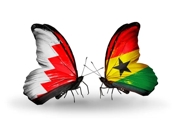 Motyle z flagi Bahrajnu i ghana na skrzydłach — Zdjęcie stockowe