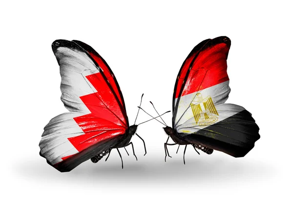 Butterflies with Bahrain and Egypt flags on wings — Stock Photo, Image