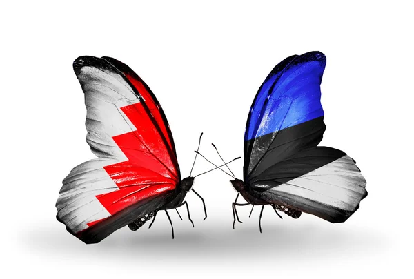 Papillons avec des drapeaux Bahreïn et Estonie sur les ailes — Photo