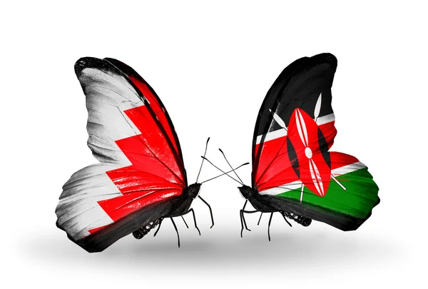 Papillons avec des drapeaux Bahreïn et Kenya sur les ailes — Photo